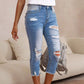 Cropped damejeans med hull og rå kant – Vasket og tøff stil